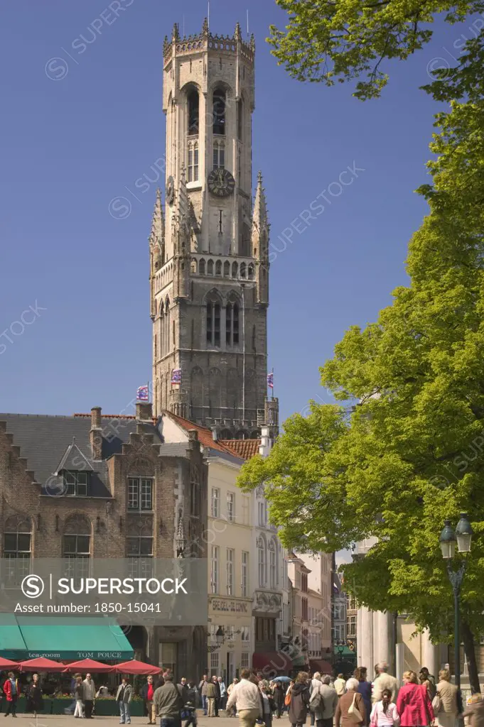 Belgium, West Flanders, Bruges, 'View Of The Belfort From The Burg, People Walking In The Street.'