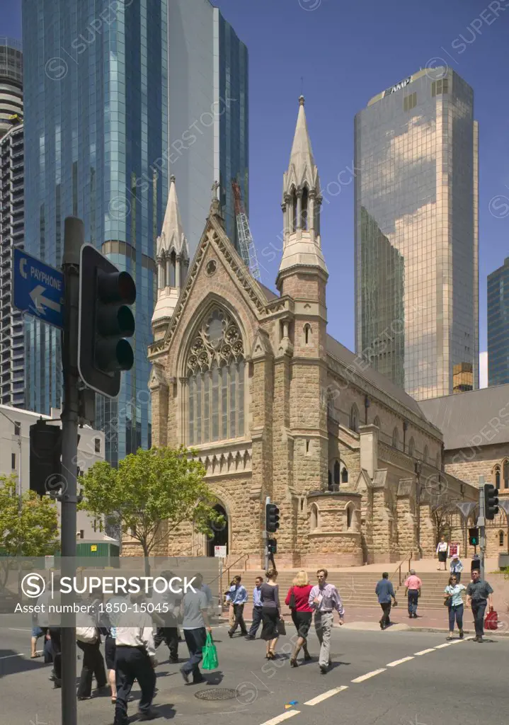 Australia, Queensland, Brisbane, People Crossing Over A Road In Front Of St Stephen'S Cathedral.