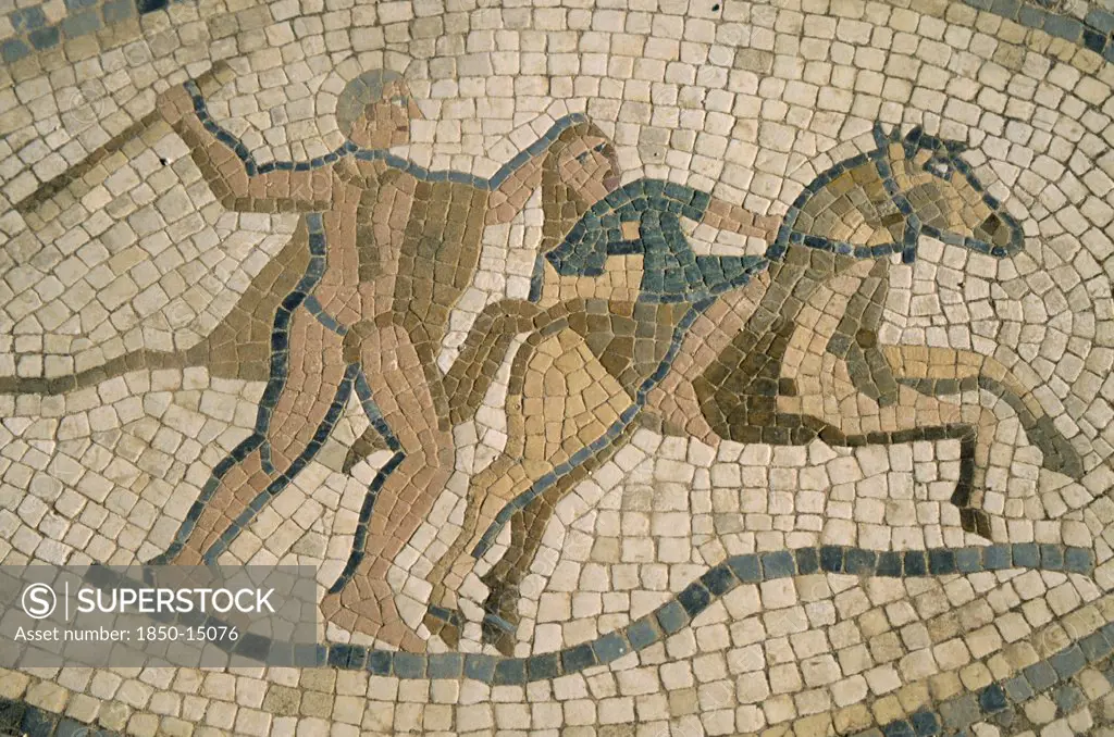 Morocco, Volubilis, Detail Of Mosaic Depicting Horseman And Figure With Club.