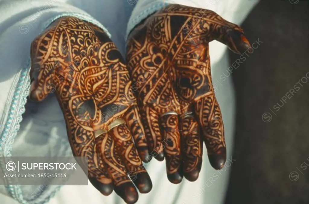 Morocco, Fes, Cropped View Of WomanS Hands With Palms Decorated With Intricate Henna Design.
