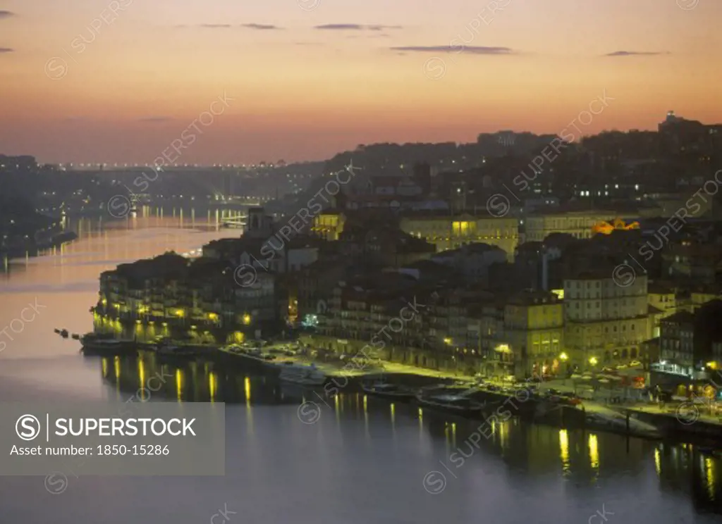 Portugal, Porto, Oporto, City And The Douro River At Sunset.