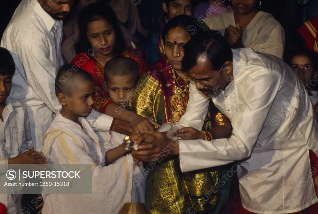 India, Gujarat, Ahmedabad, Young Boy At His Upanayana Brahmin Thread Ceremony.