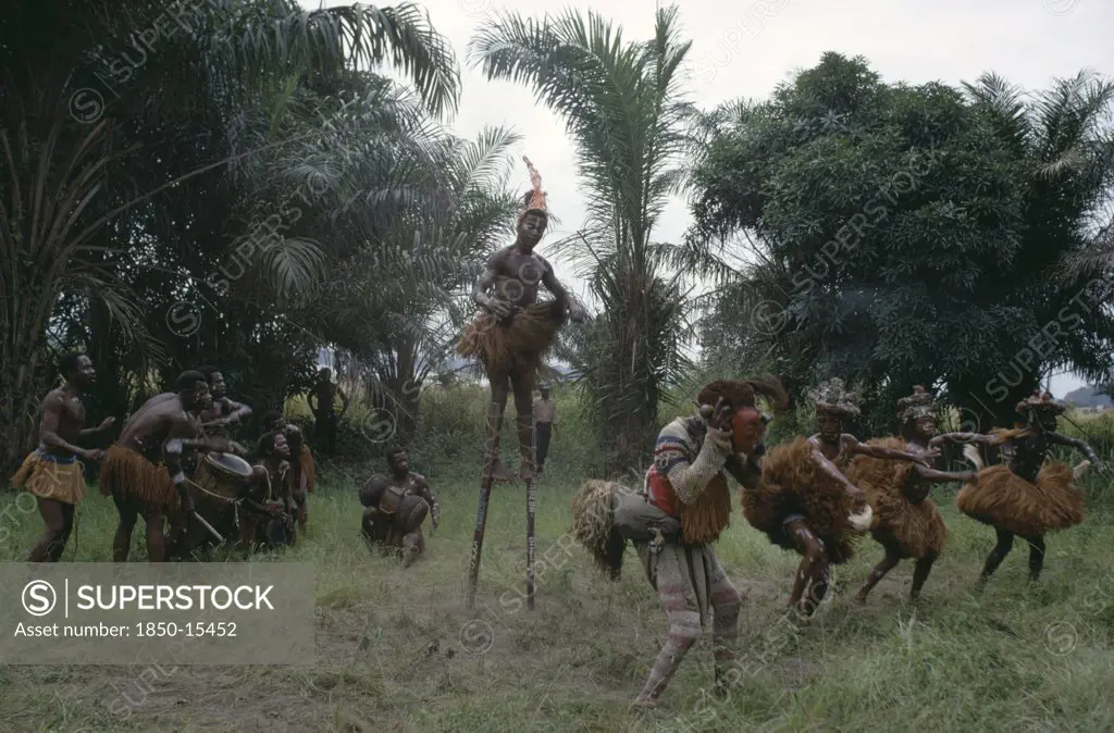 Congo, Festivals, Dance, 'Chokwe Tribe Masked Dancers, Drummers And Stilt Walker.'