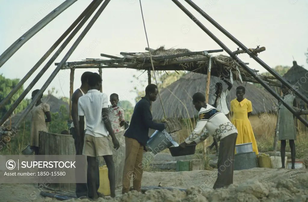 Ethiopia, Work, Collecting Water At Well Sunk By International Voluntary Service.