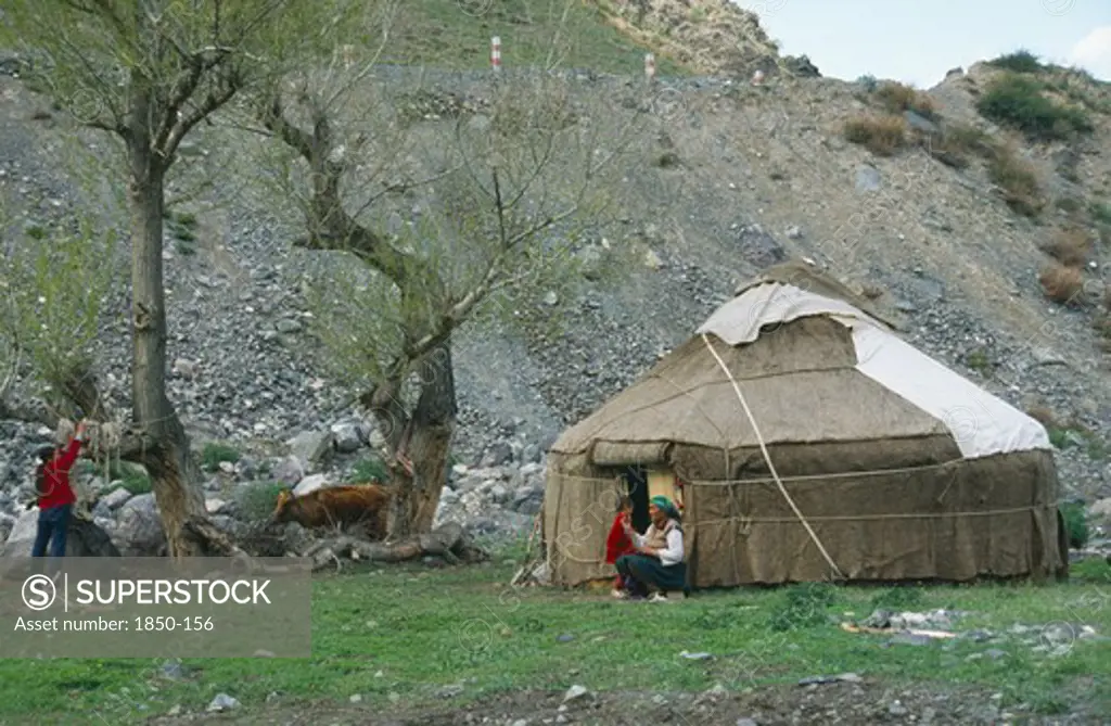 China, Xinjiang , Tianchi, 'Kazakh Yurt, Tent, With Women And Young Boy Outside'