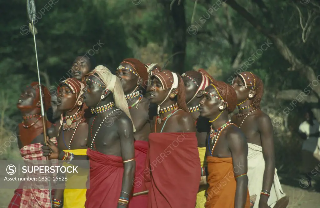 Kenya, South Horr, Samburu Moran Warriors Singing.