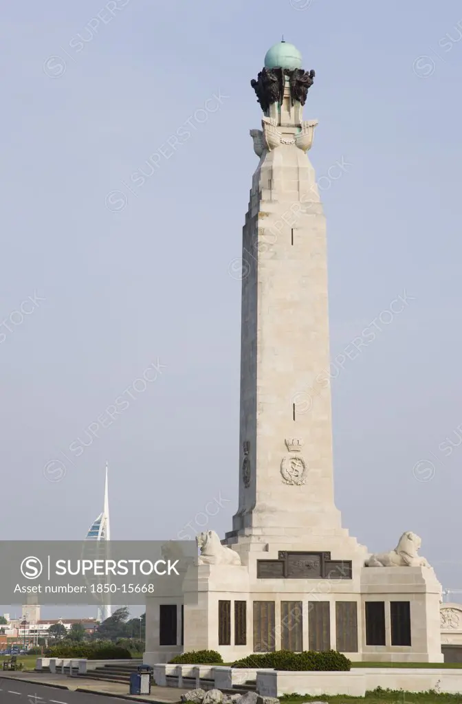 England, Hampshire, Portsmouth, World War One Naval Memorial Obelisk On Southsea Seafront Designed By Sir Robert Lorimer With Sculpture By Henry Poole With The Spinnaker Tower And The Anglican Cathedral Of St Thomas Beyond.