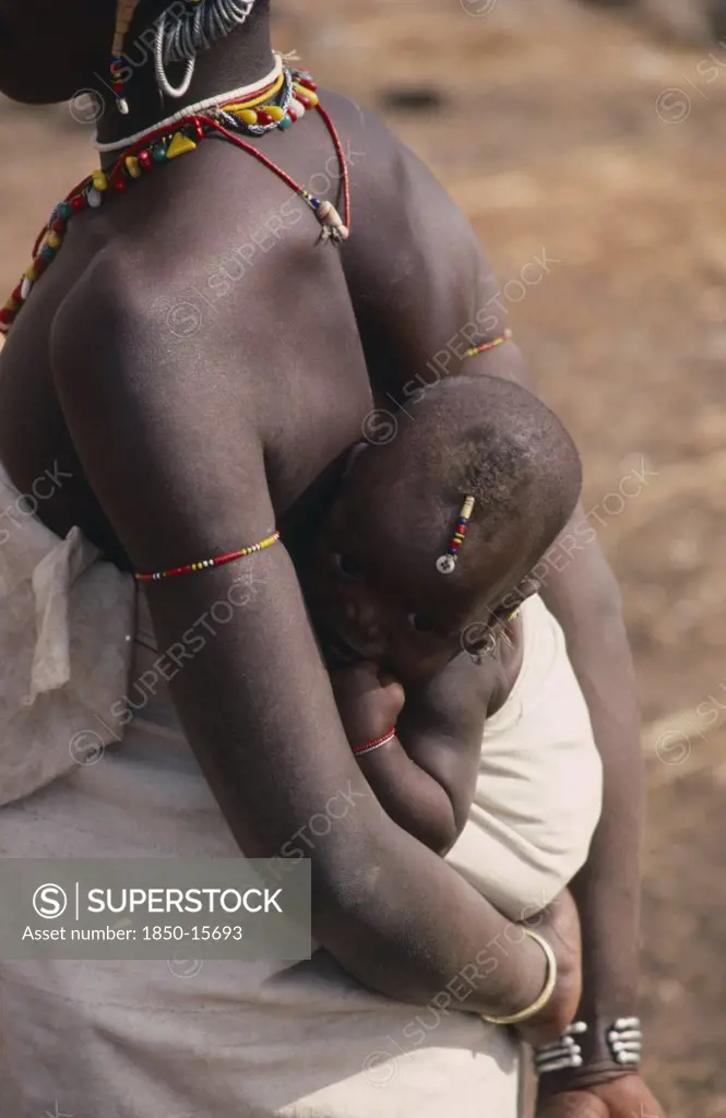 Senegal, Children, Carrying, 'Baby Carried In Sling On Mothers Back, Both Wearing Bead Jewellery.'