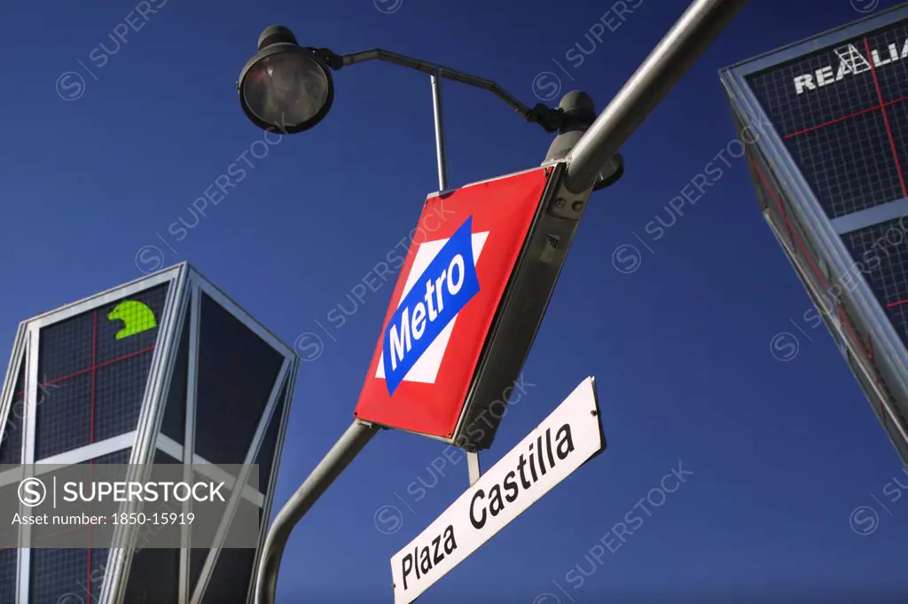Spain, Madrid, 'City Centre Metro Sign, Plaza Castilla, Beneath The Torres Puerta Europa. Underground Train Station.'