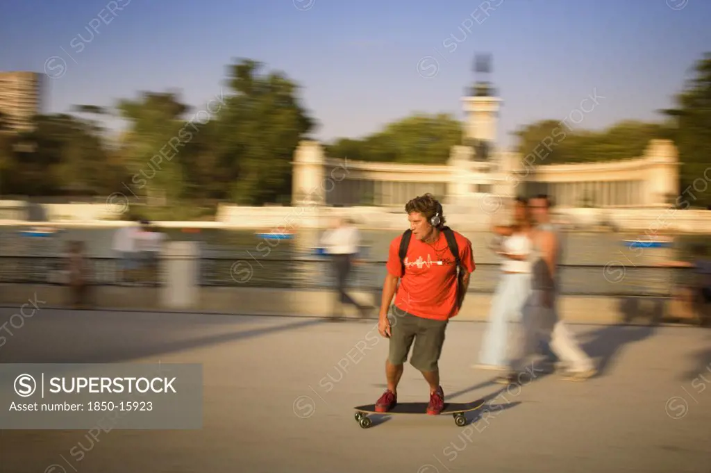 Spain, Madrid, 'A Skate Boarder In Retiro Park, Motion, Blur, Movement'