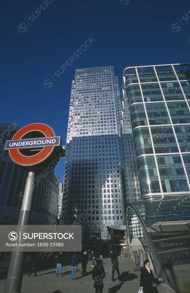 England, London, Canary Wharf. The Tower At 1 Canada Square With Underground Station Sign In The Foreground.