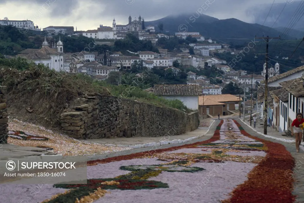 Brazil, Religion, Easter, Easter Day Parade Route Leading Down Hill Towards Town Carpeted With Flowers.