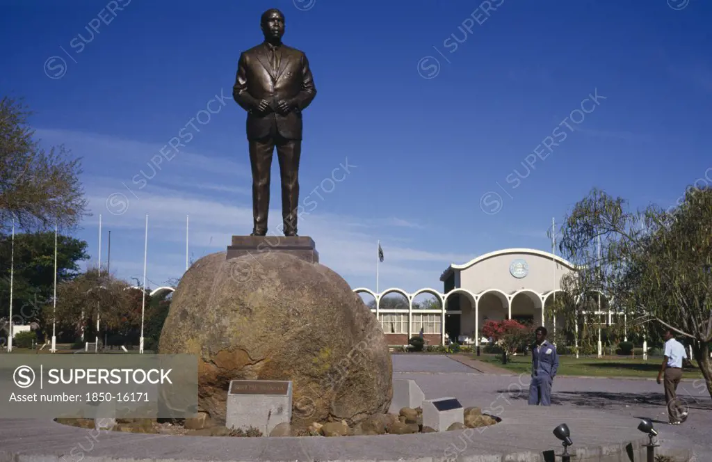 Botswana, Garborone, Statue Of Seretse Khama The First President Of Botswana With The National Assembly Building Behind.