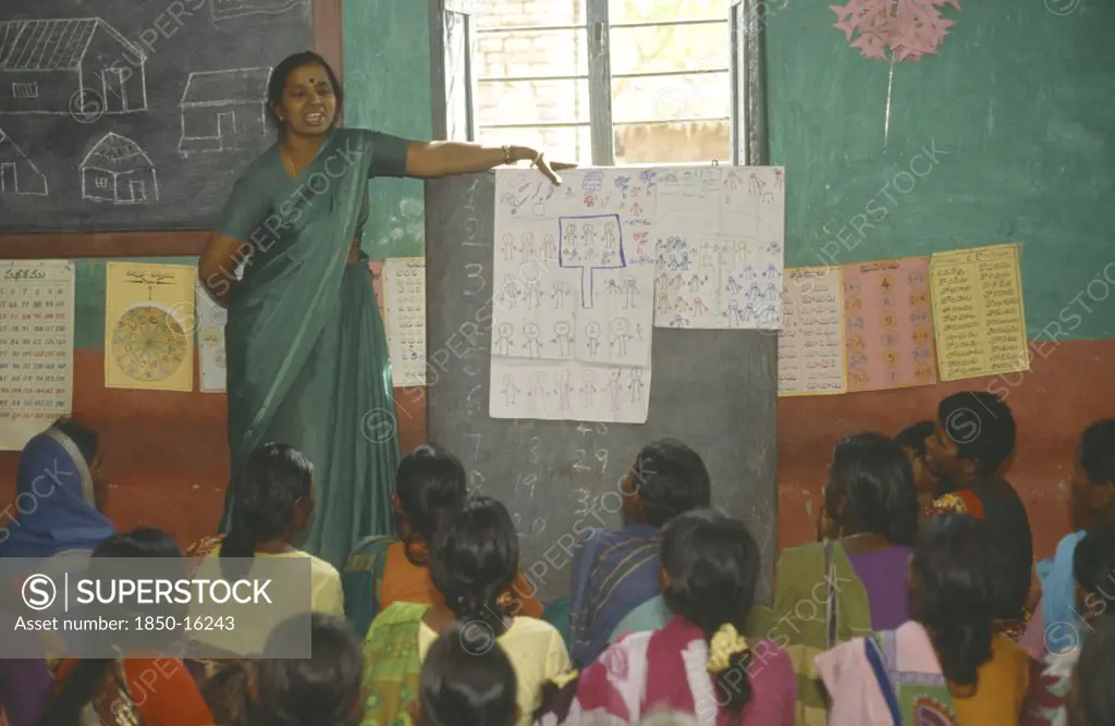 India, Andhra Pradesh, Female Teacher And Pupils In WomenS Adult Literacy Class.