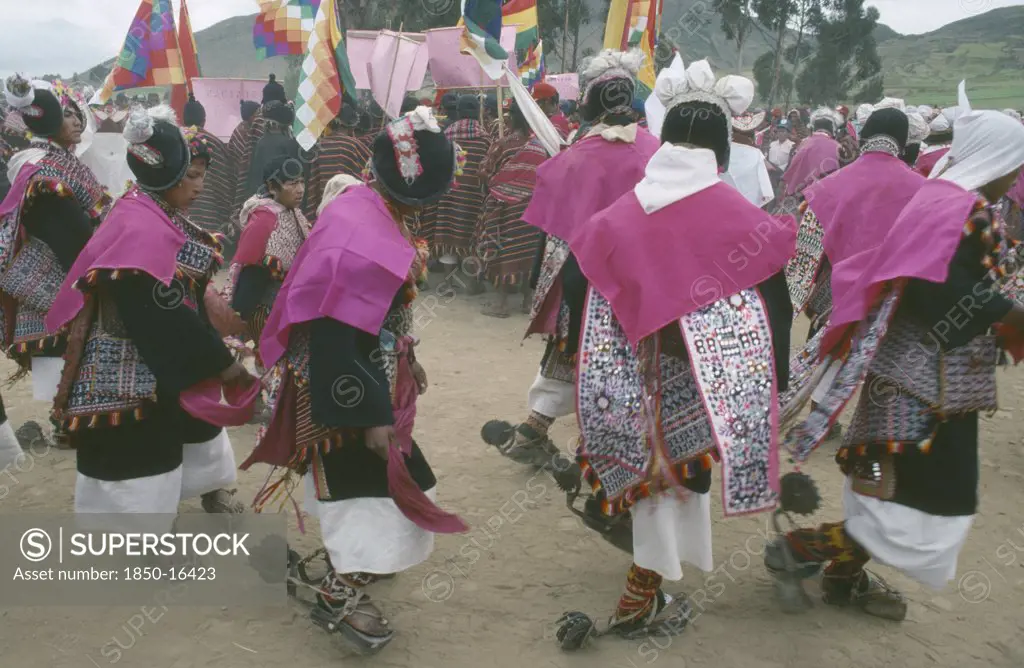 Bolivia, Sucre, Tarabuco, Male Dancers In Costume During Phujllay Celebrations.