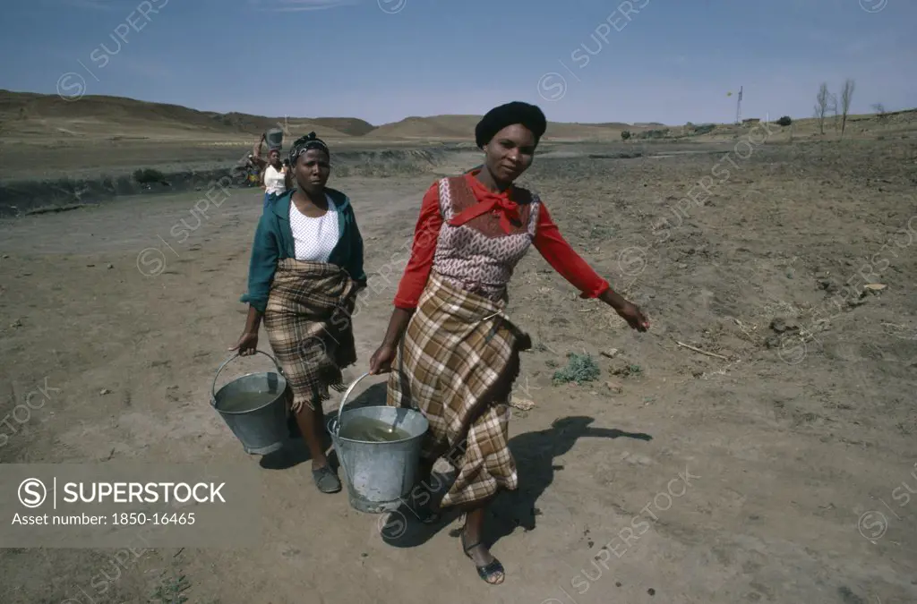 Lesotho, Water, Women Carrying Buckets Of Water