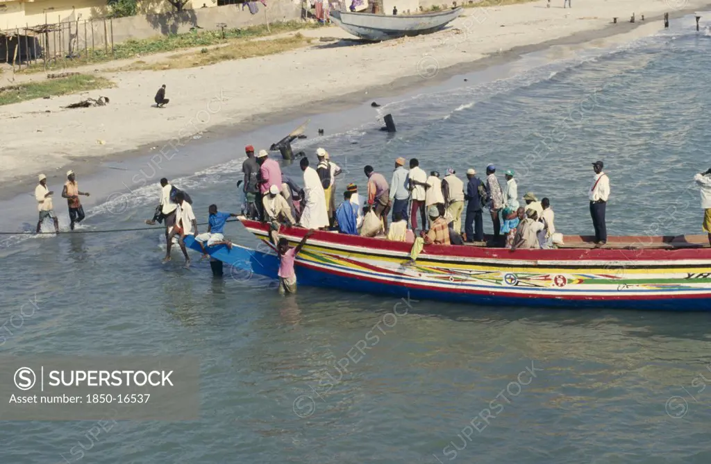 Gambia, Banjul, Busy Local Ferry Arriving Into Shore