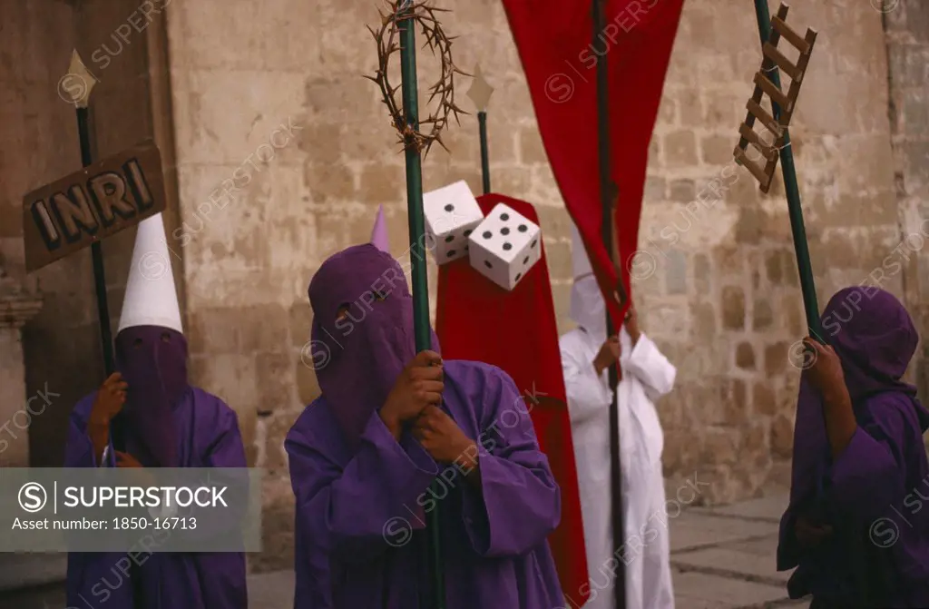 Mexico, Oaxaca, Penitents Holding Staffs Displaying Different Symbols During Holy Week.