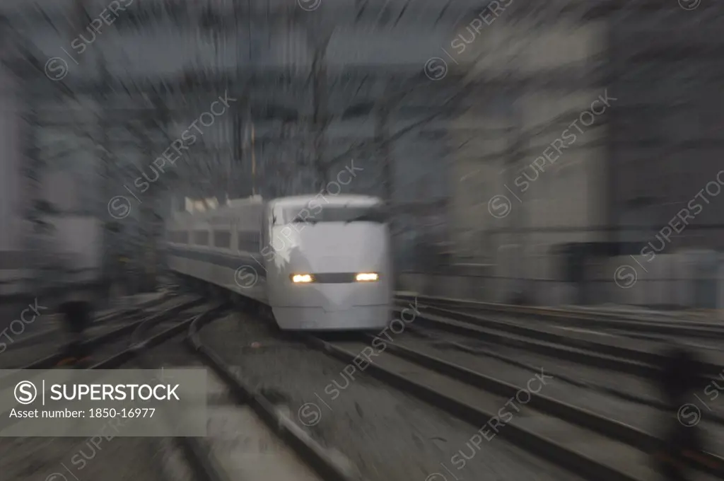 Japan, Honshu, Tokyo, 'A Bullet Train, Hikari Shinkansen, Arrives At Tokyo Station'