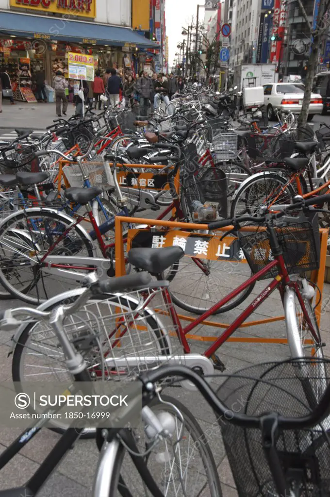 Japan, Tokyo, Shinjuku, 'Outside Shinjuku Station, Bicycles Clutter The Pavement'