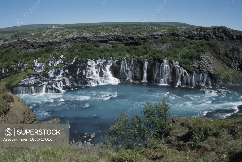 Iceland, Borgarfjordur, Hraunfossar Falls On The Hvita River. Water Comes From Beneath Hallmundarhraun Lava Field.