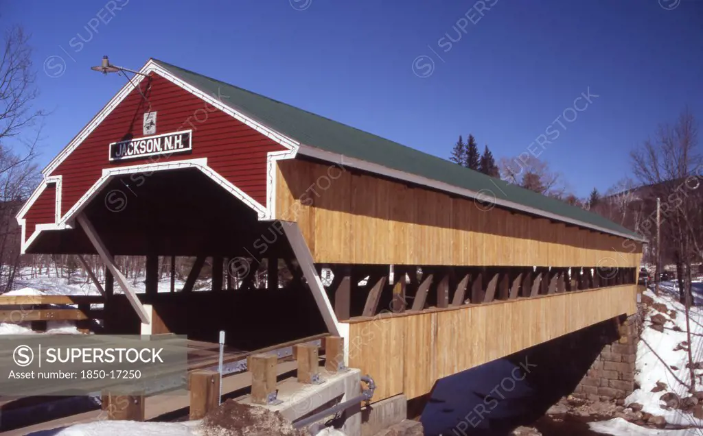 Usa, New Hampshire, Jackson, 'Wooden Covered Bridge Over Water, Snow On The Ground.'