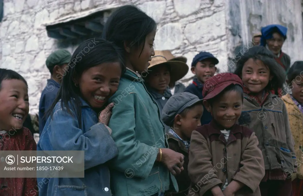 Tibet, Lhasa, Group Of Smiling Children.