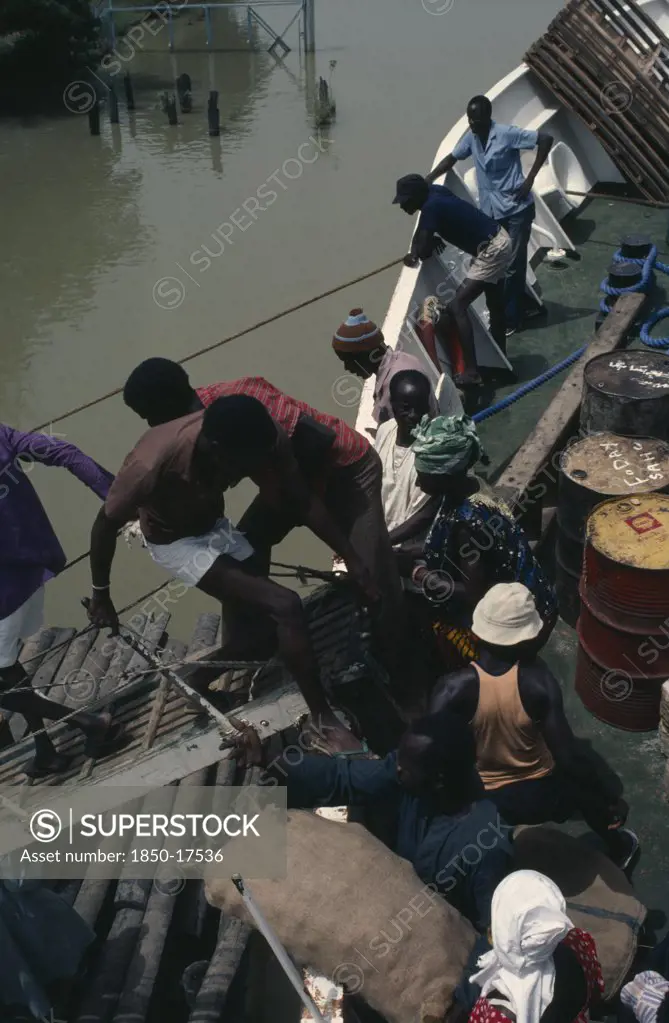 Gambia, Transport, People Boarding Boat On The River Gambia.