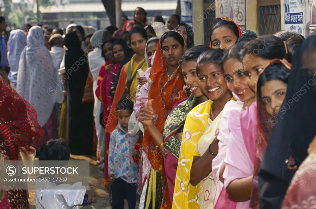 Bangladesh, Dhaka, Crowd Of Women Waiting In Line At Polling Station To Vote In Local Elections.