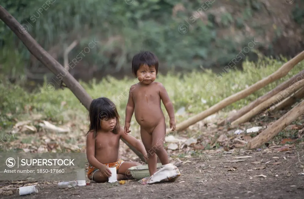 Panama, Children, Two Embera Indian Children Playing With Plastic Cups And Bowls