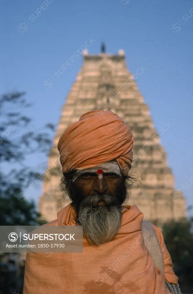 India, Karnataka, Hampi, Holy Man In Front Of Virupaksha Temple In The Ancient City Of Vijayanagar