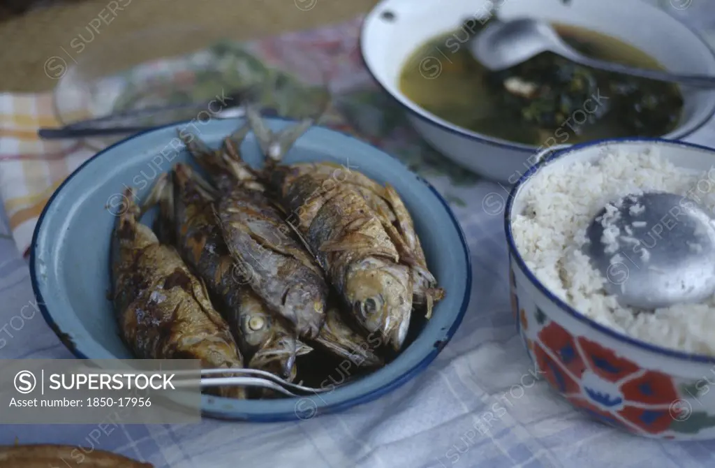 Madagascar, Vohemar, Typical Meal Of  Fish Served With Rice And A Piquant Sauce.