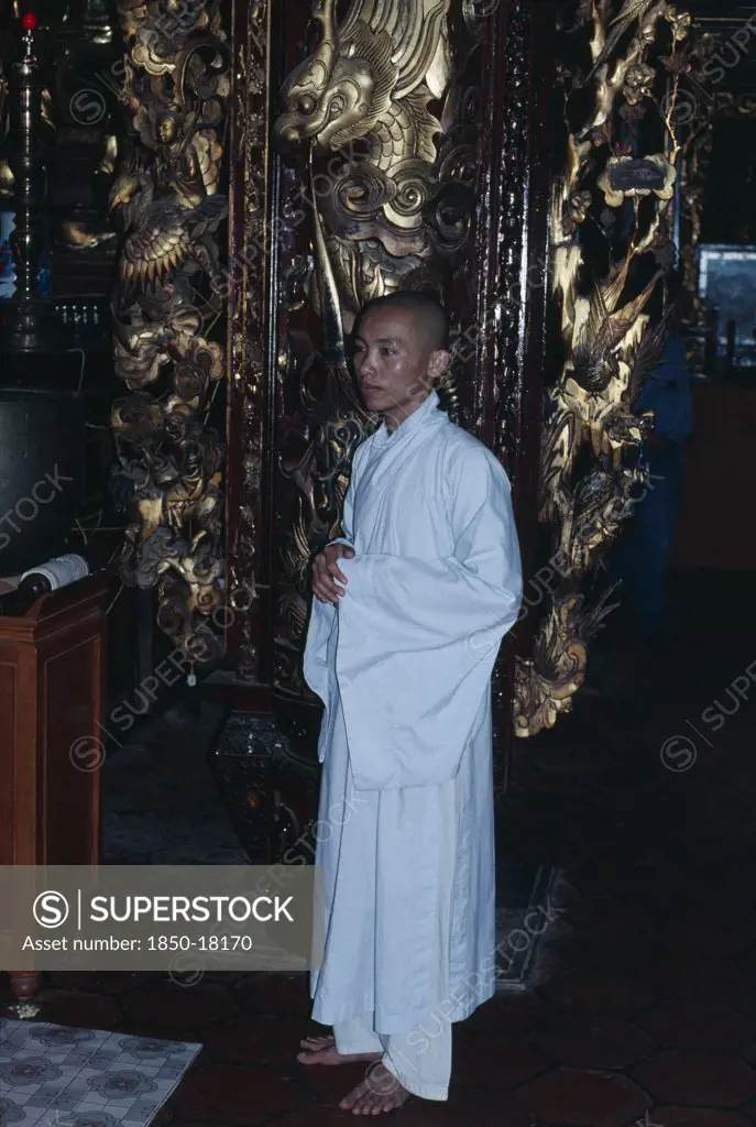 Vietnam, Mekong Delta, My Tho, Monk Wearing White Robes In Vinh Trang Pagoda