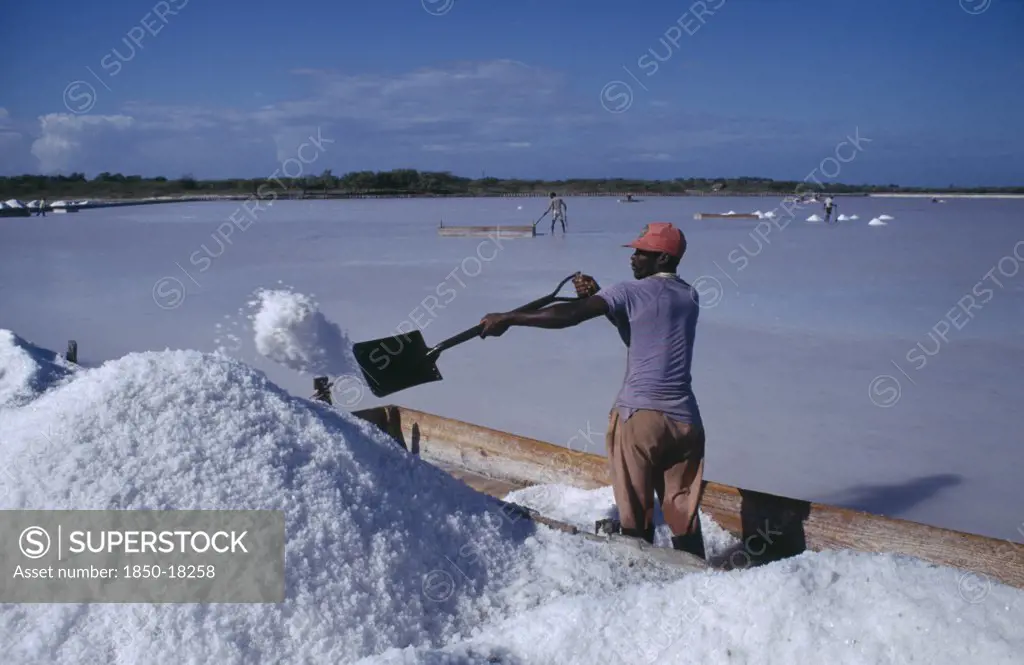 Dominican Republic, Las Salinas, Man Working At Salt Mines