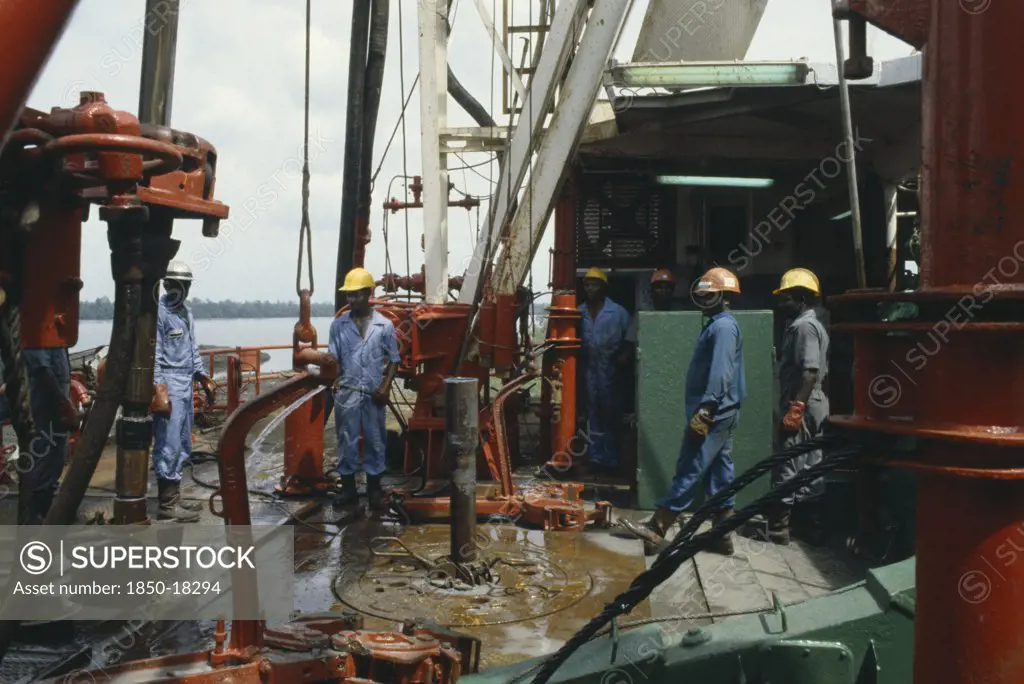 Nigeria, Rivers State, Workers On Oil Rig.