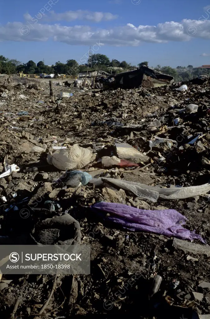 Nicaragua, Managua Province, Managua, 'The 'Waste Basket Of Chureca' Has Existed Since The Late 1960'S In The Acahualinca District Of Managua, Nicaragua. It Covers 42 Hectares, Is Bombarded With Thousands Of Tonnes Of Waste A Day And Is Home To Over 170 Struggling Families. By Day Over 1500 More Nicaraguans Arrive At The Site, Some Of Whom Are Children Who Have Been Sent By Their Parents, Others Come By Their Own Initiative. All Compete With The Adults To Find, Harvest And Re-Sell Recyclable Mat