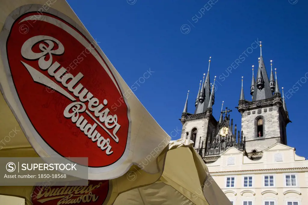 Czech Republic, Bohemia, Prague, Restaurant Umbrellas Advertising The Original Czech Budweiser Budvar In The Old Town Square In Front Of The Church Of Our Lady Before Tyn