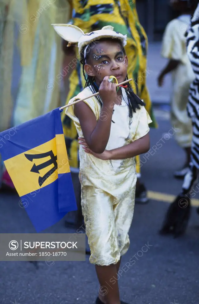 England, London, Notting Hill Carnival Young Girl In Gold Costume.