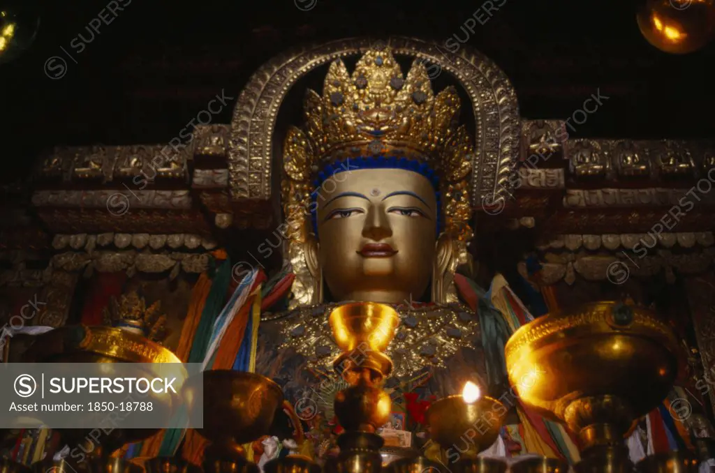 China, Tibet, Gyantse, 'Butter Lamps And A Statue Of Sakyamuni, The Present Buddha, In Pelkor Chode Monastery.'