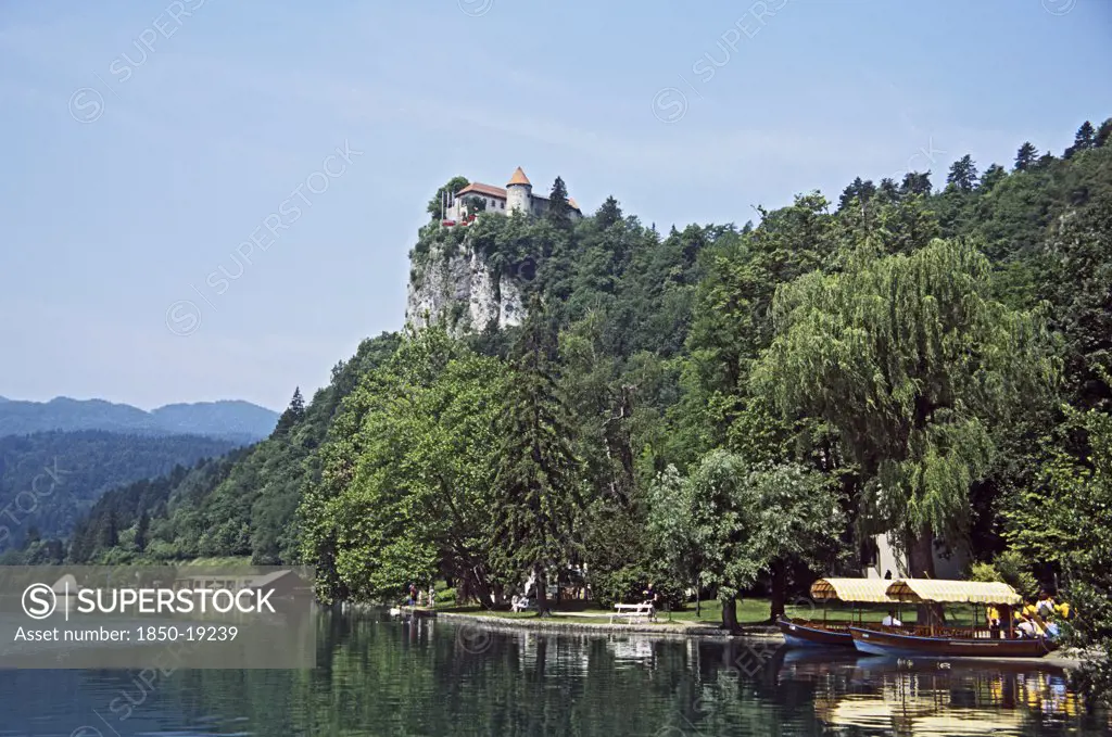 Slovenia, Lake Bled, 'The Castle Is One Of The Most Beautiful And Important Monuments In Slovenia. Perched On A Cliff 100M Above Lake Bled It Houses A Museum, The Castle Printworks,A Wine Cellar, A Herbalist'S Shop, An Artist'S Studio And A Restaurant. Special Functions And Weddings Are Organised At The Castle '