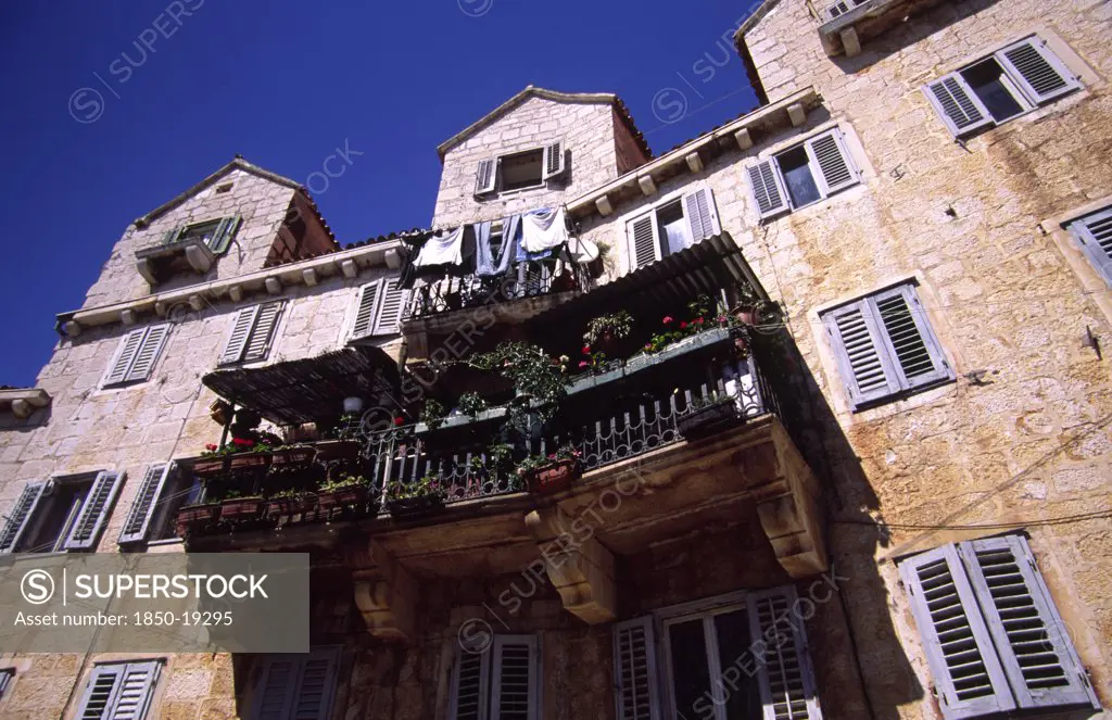 Croatia, Dalamatia, Brac, Bol Village House With Balcony. The Old Village Of Bol On The Southern Coast Of The Island Of Brac Retains Much Of Its Medieval Feel