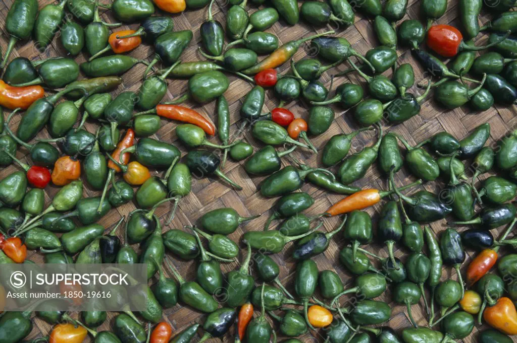 Nepal, Khumbu Region, Chilli Peppers Laid Out To Dry In The Sun.