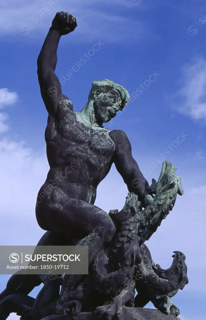 Hungary, Budapest, Gellert Hill.  Detail Of Statue Of Male Figure Slaying A Multi Headed Serpant. Eastern Europe