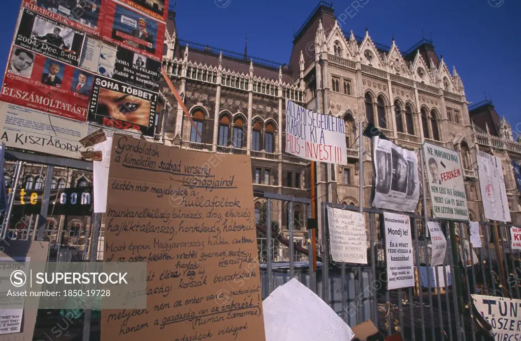 Hungary, Budapest, 'Hand-Written Posters And Signs Attached To Railings Outside Parliament To Demonstrate Against Socialist Leader Ference Gyurcany, 50 Years After 1956 Uprising Againist Communist Rule. '