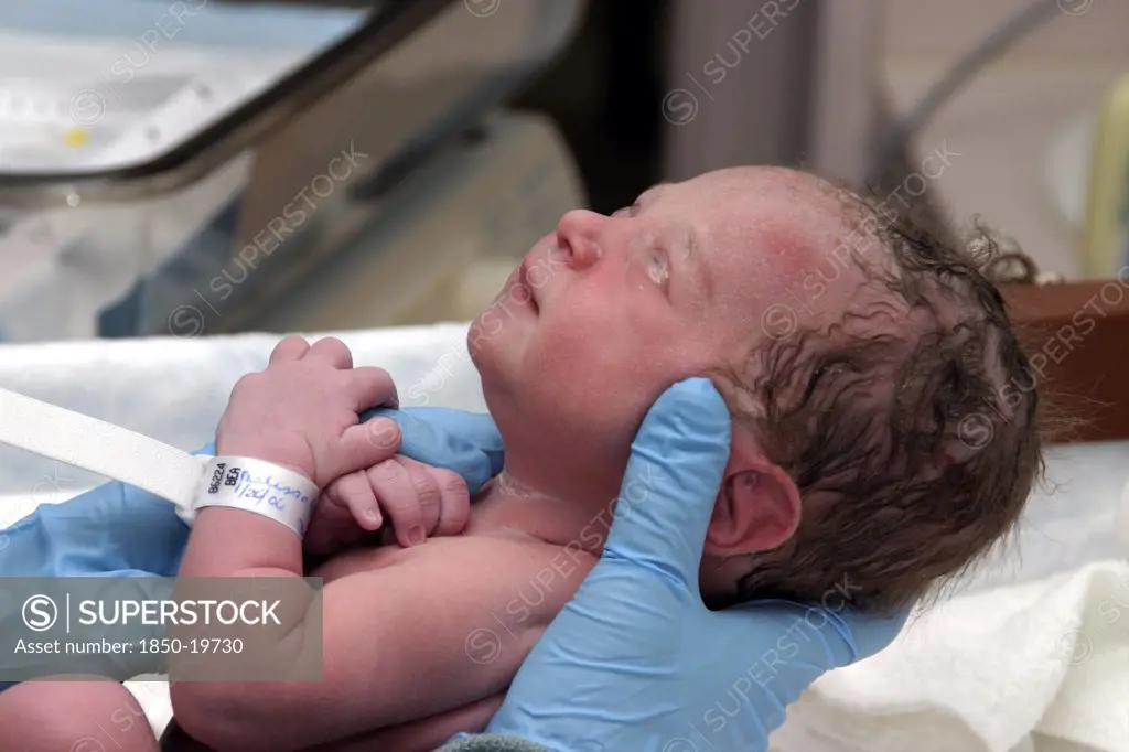 Children, Babies, Birth, 'Kylan Stone, Newborn Baby Girl Being Checked By Nurse In Hospital.'