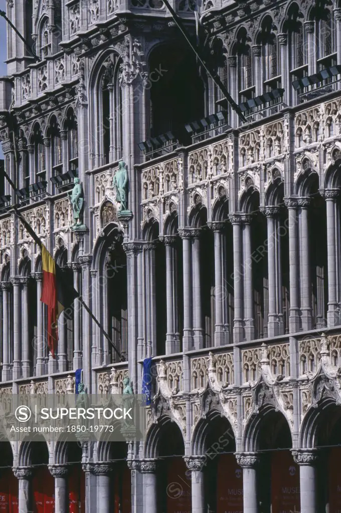 Belgium, Brabant, Brussels, Grand Place.  Maison Du Roi.  Part View Of Exterior With Carved  Colonnade And Statues.