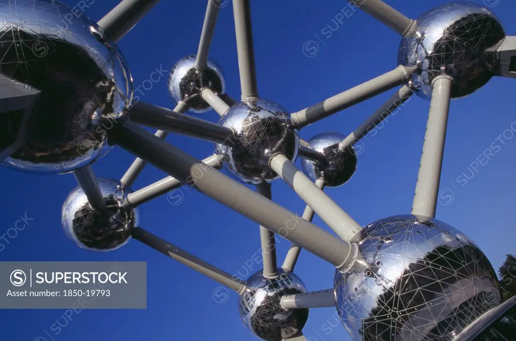 Belgium, Brabant, Brussels, The Atomium.  Looking Up Through Frame Of Structure.