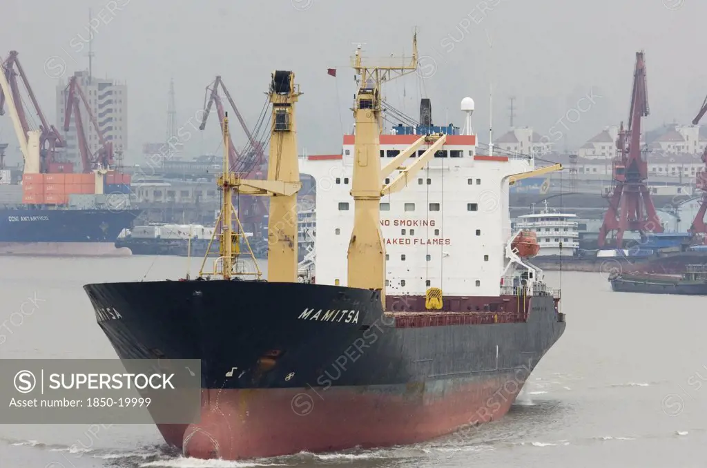China, Jiangsu, Shanghai, Freighter Sailing From Shanghai Along Huangpu River