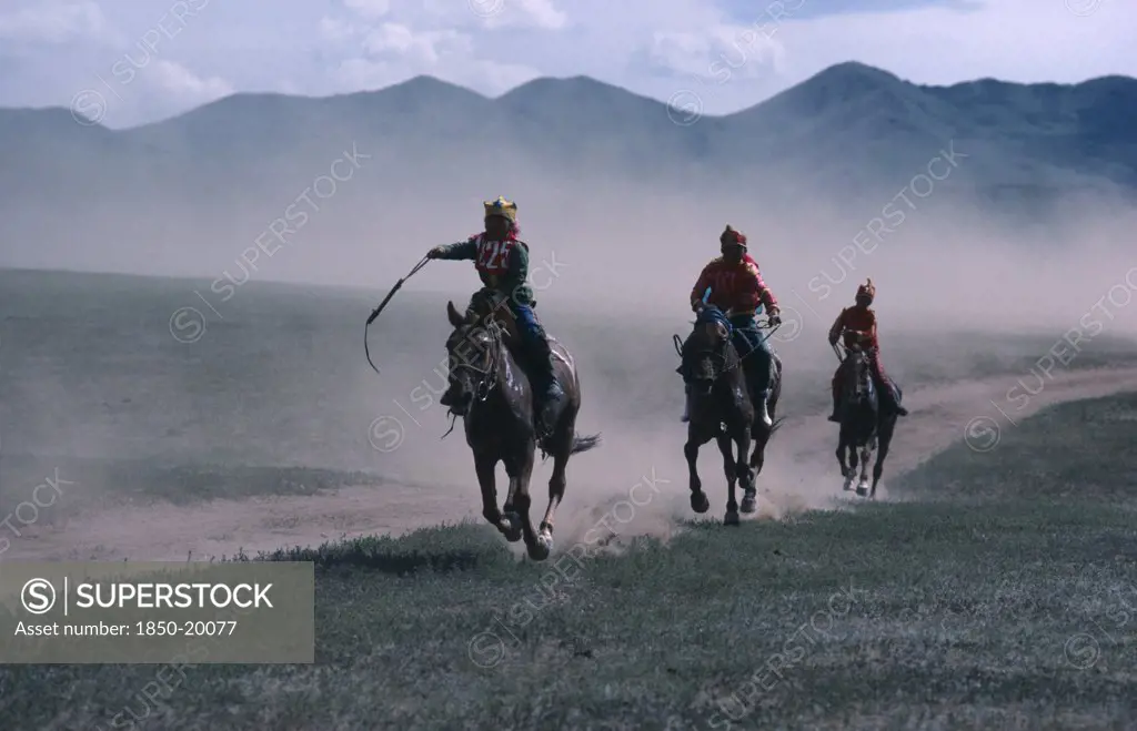 Mongolia, Sport, Boy Jockeys And Horses Taking Part In National Day 50Km Horse Race.