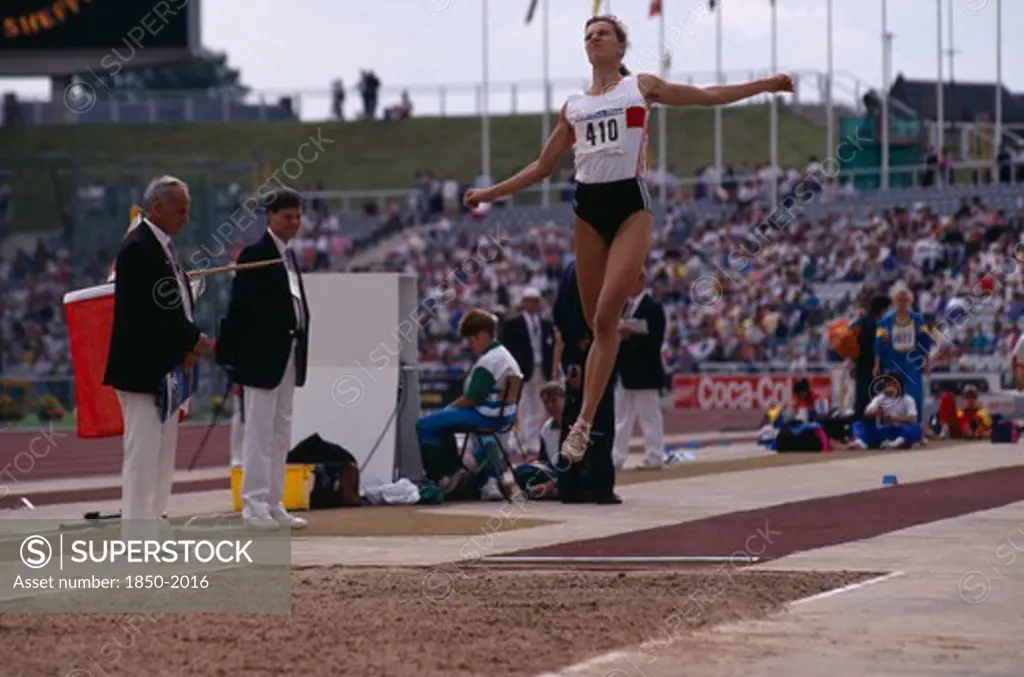 Sport, Athletics, Heptathalon, 'B. Cautzsh Competing In The Long Jump At The World Student Games, Don Valley Stadium, Sheffield, England.'